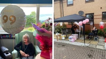 Glasgow care home Resident enjoys socially distanced visit on 99th birthday